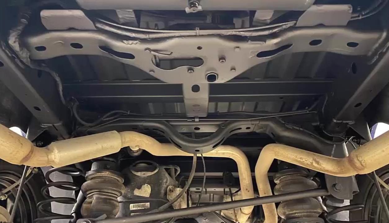 Truck undercarriage with rust proofing undercoating